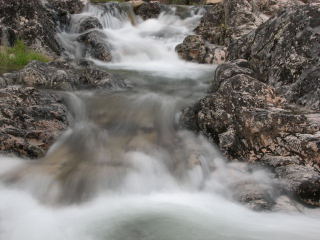 side rivletts of Rancheria Creek running over moonscape rockland